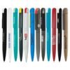 Assorted branded pens with company logos
