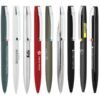 Assorted branded pens lined up on white background