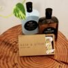 Toiletries and cotton swabs on wooden surface