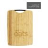 Uber Eats logo on wooden clipboard