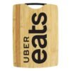 Uber Eats logo on bamboo cutting board