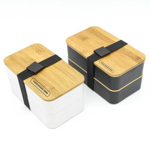 Two modern branded bento boxes with bamboo lids.